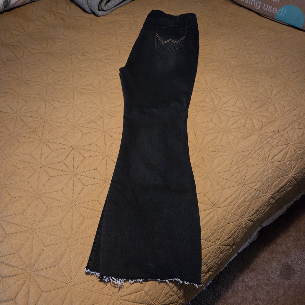 Black Flared Jeans with Frayed Hem